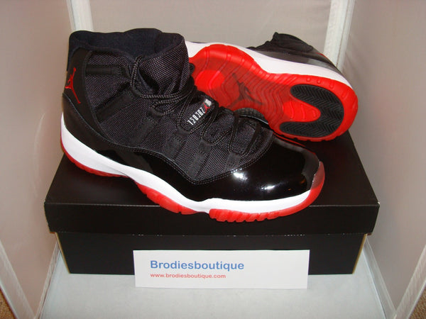 Nike Air Jordan Retro XI 11 "Bred" Black / Red